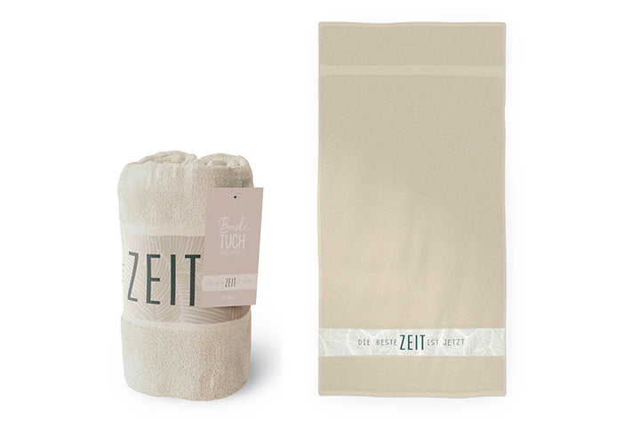 379391 beiges Badetuch mit Spruch Die Beste Zeit ist jetzt, Saunatuch, Strandtuch von Geschenk für Dich