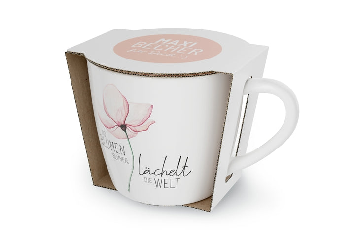 910593 Maxi-Becher “Wo Blumen blühen, lächelt die Welt” von Geschenk für Dich, 4027268335282